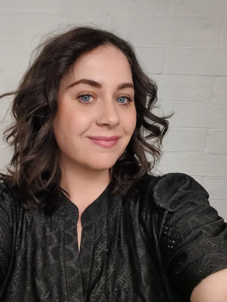 A selfie of Laura, Bombshell's Lash specialist. Also offers brows, brow lamination, henna brows, brow threading, dermaplaning, and facials.